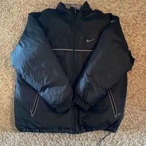 Black Nike puffer jacket.